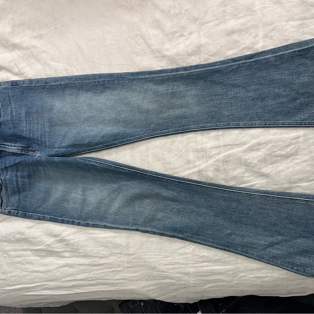 MOTHER Flare Jeans in Faded Blue